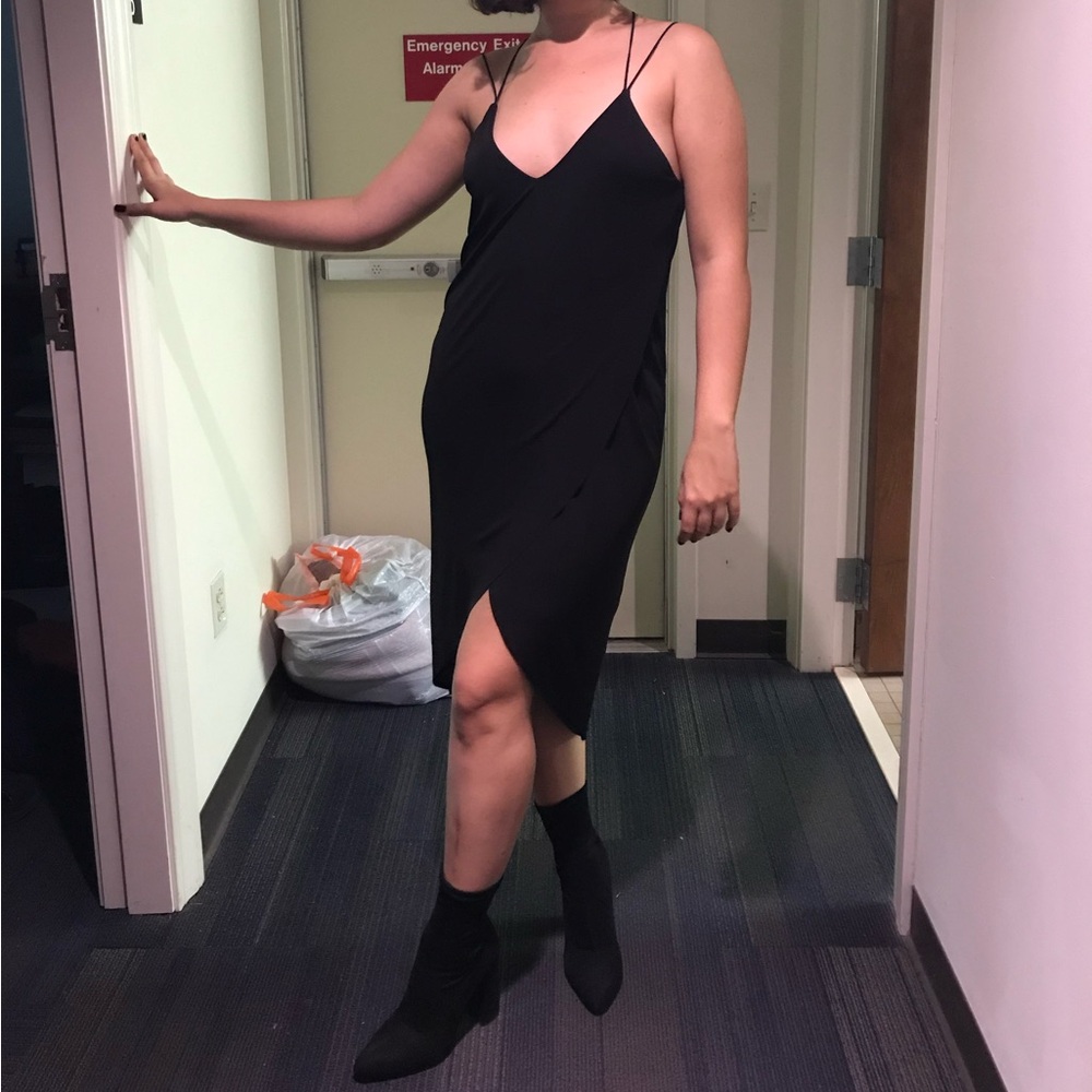 Black v-cut skirt and crossed back evening dress.